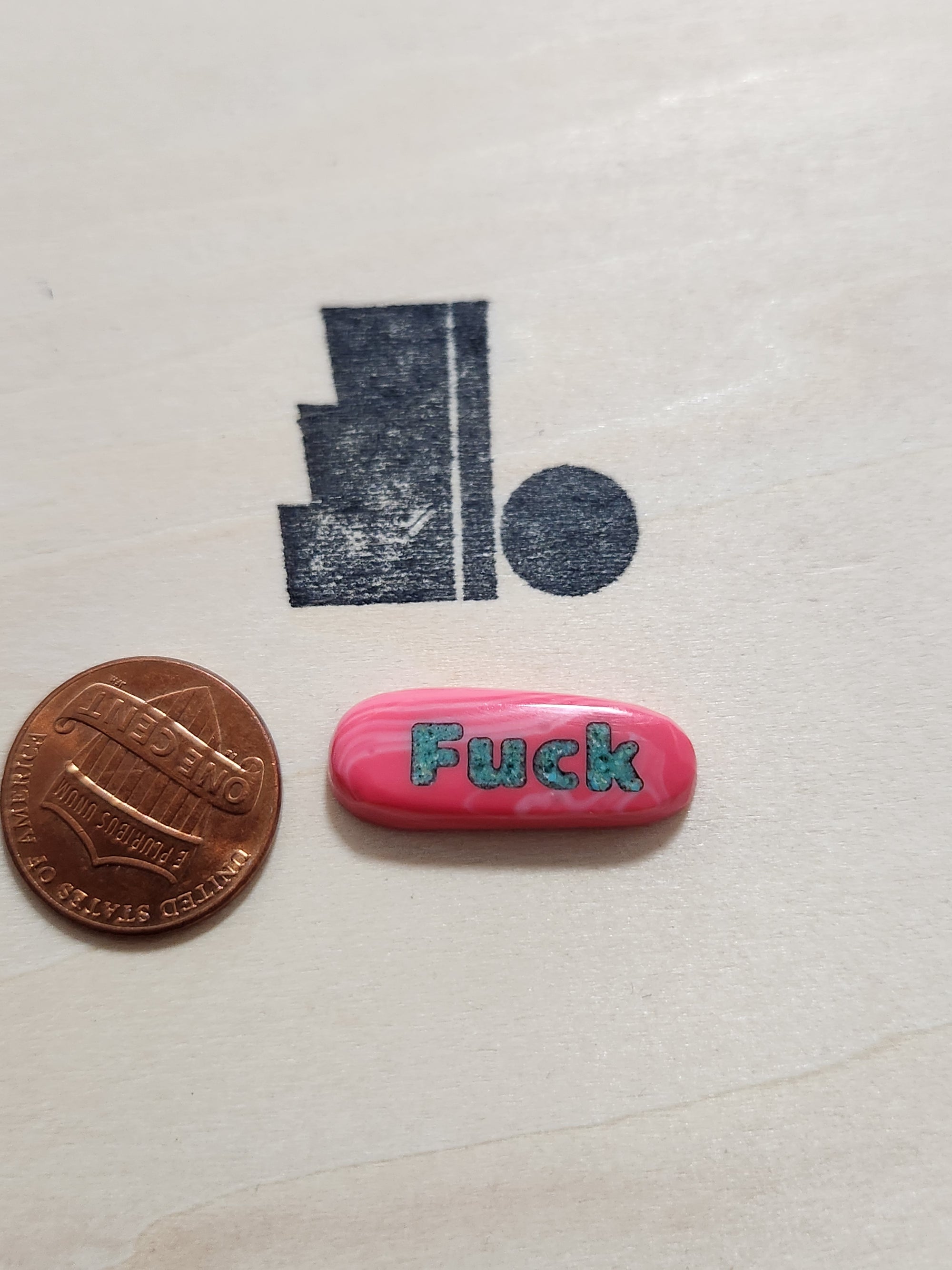 Little f word pill shape 1